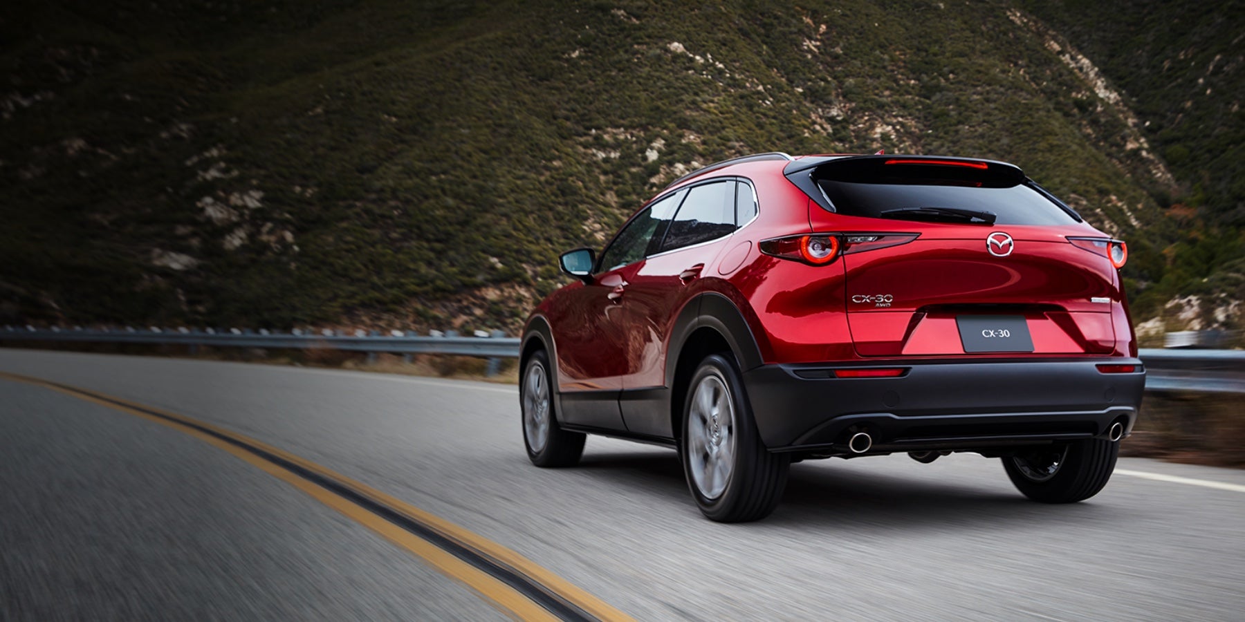 Red 2020 Mazda CX-30 Driving on the road | Baglier Mazda in Butler, PA